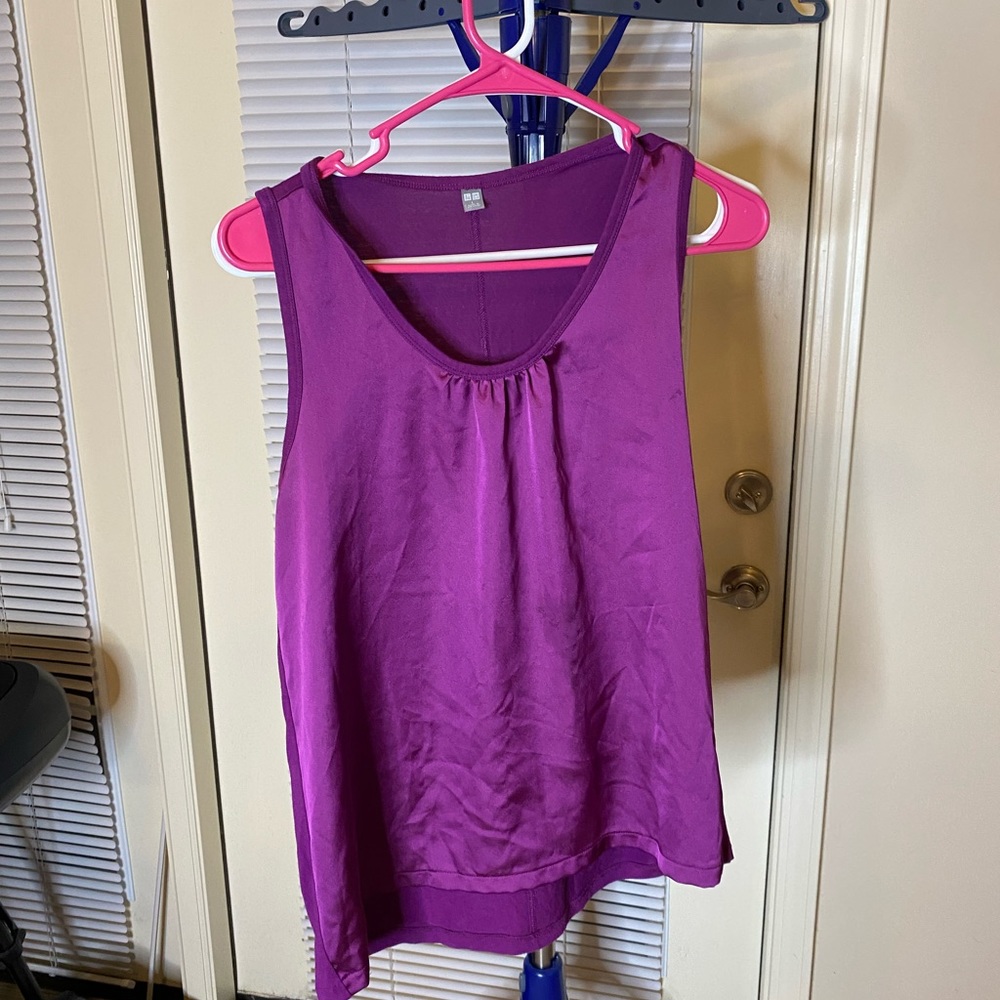 Basic purple top, wrinkles remove easy with steam